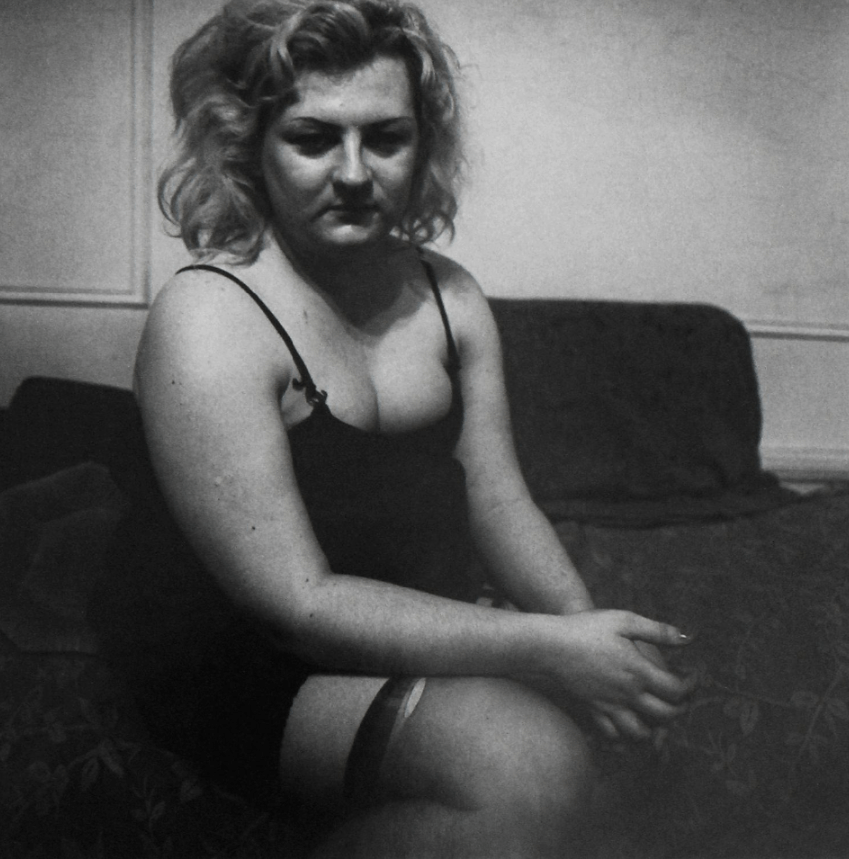 Transvestite with Torn Stocking, New York City, 1966 © Diane Arbus